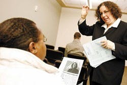 Atheist lobbyist Lori Lipman Brown, right, talks to student Finesse Mali Grant before a presentation she gave in the SUB on Tuesday. 