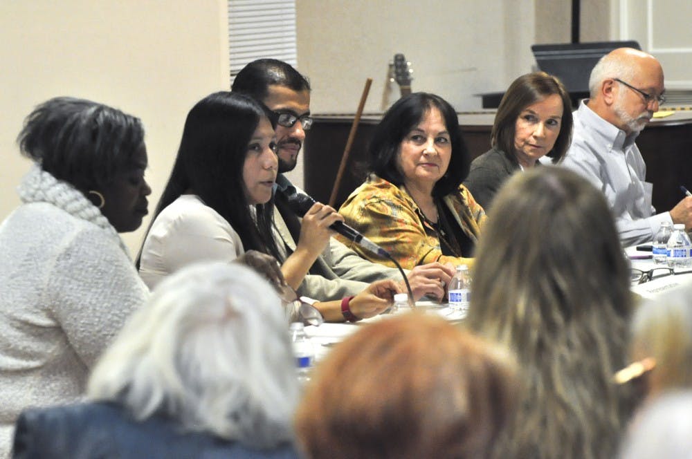 Seated among other state legislators New Mexico Rep. Georgene Louis speaks at a forum at the Albuquerque Mennonite Church on Thursday. ActionNM held the forum for the legislators to discuss with the community political issues that would arise during the upcoming legislative session.