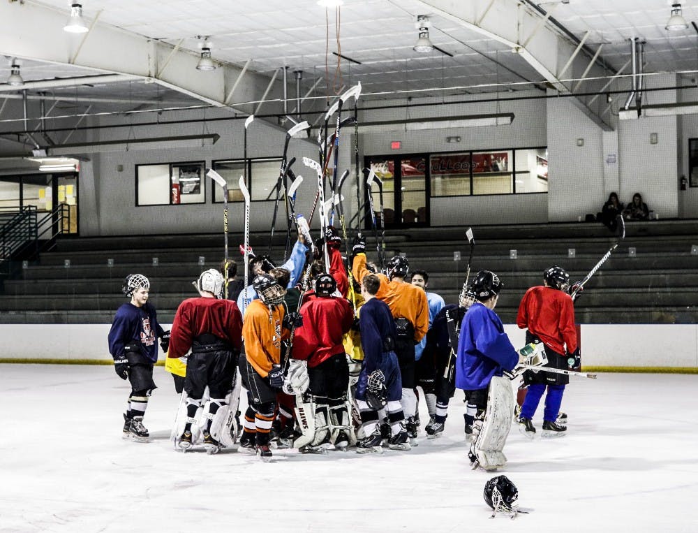 The UNM Hockey Club huddles after a successful practice on Aug. 30, 2017. They are currently undefeated with a 4-0 record. Their next home match is on Oct. 13, 2017 against Colorado Mesa Vista. 
