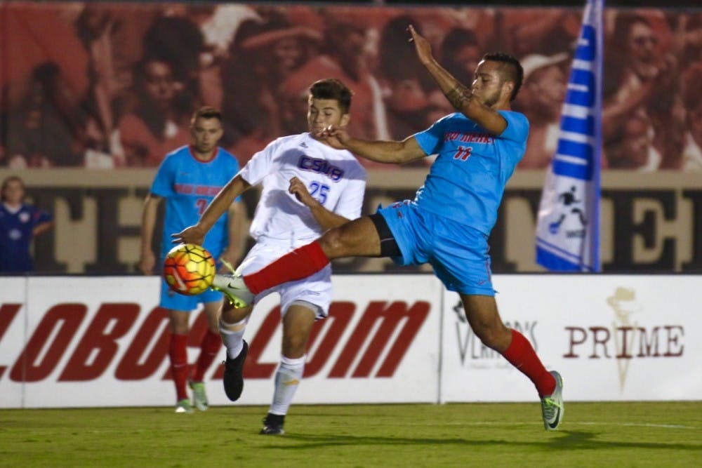 Senior forward Niko Hansen lunges toward the ball Friday Sept. 9, 2016 at the UNM Soccer Complex. The Lobos beat CSU Bakersfield 1-0 in overtime.&nbsp;