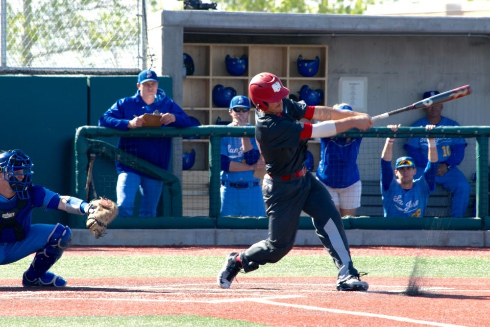 Senior Dalton Bowers makes contact with the ball Saturday afternoon at Santa Ana Star Field. UNM beats San Jose State 3-2.