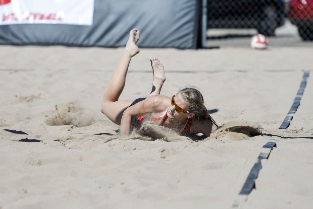 Senior Lise Rugland dives for a ball during a match against Colorado Mesa Friday, March 18, 2016 at Lucky 66 Bowl. The Lobos will play their first match against Benedictine University at Mesa this Thursday in Mesa, Arizona.
