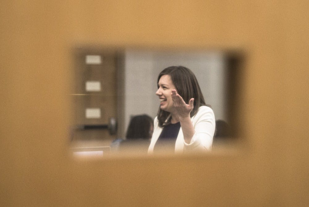 	Sarah Crawford mingles with the participants at the end of the “Elect Her” workshop.