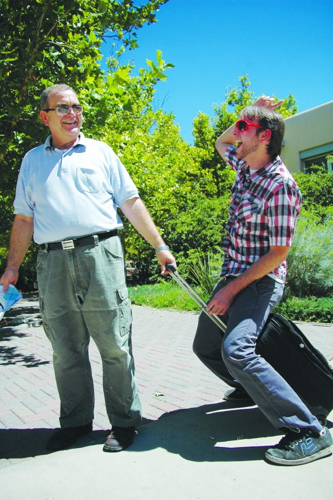 	Musician Sam Irons interacts with an unsuspecting pedestrian in his own way. Irons’ crass behavior is nothing unusual, as he frequently emphasizes vulgarity as a theme in his music.