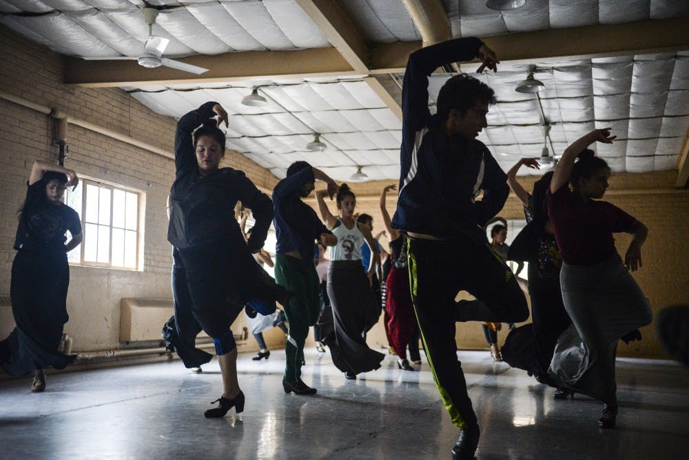 Students in an advanced flamenco class dance to the tempo played by guest instructor Lucia Alvarez at Carlisle Gym on Tuesday, Sept. 6, 2016.&nbsp;The class meets for two hours a day, five days a week.