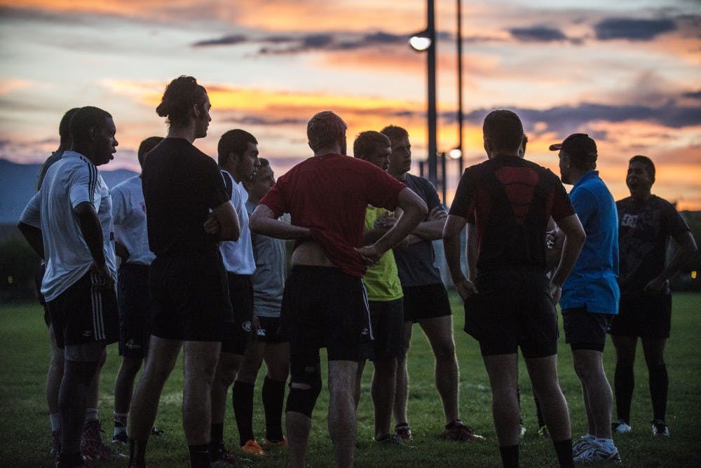 The UNM rugby team gathers together before an early morning practice during their 2015 season at Johnson Field. The Lobos will play against Utah State this Saturday at 1 p.m.