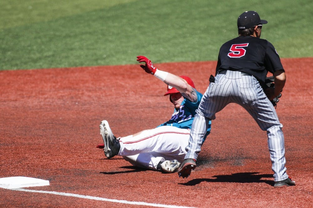 Junior Chris Devito slides into third base Sunday afternoon at Santa Ana Star Field. The Lobos lost their final game against UNLV 6-5 after winning the first two.&nbsp;