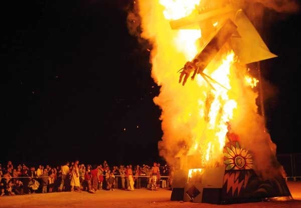 El Kookooee burns Sunday night at the South Valley Little League field. 