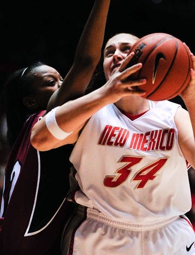 Valerie Kast led the Lobos to a blowout win Thursday, scoring 18 points and recording five blocks.