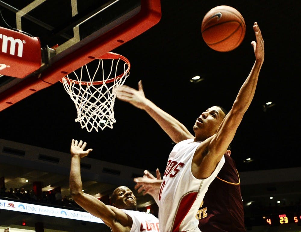 	Freshman guard Kendall Williams snares a rebound during the Lobos’ 76-62 win over Arizona State Tuesday at The Pit.
