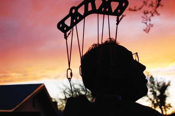 Sean Placencio executes the suicide suspension.