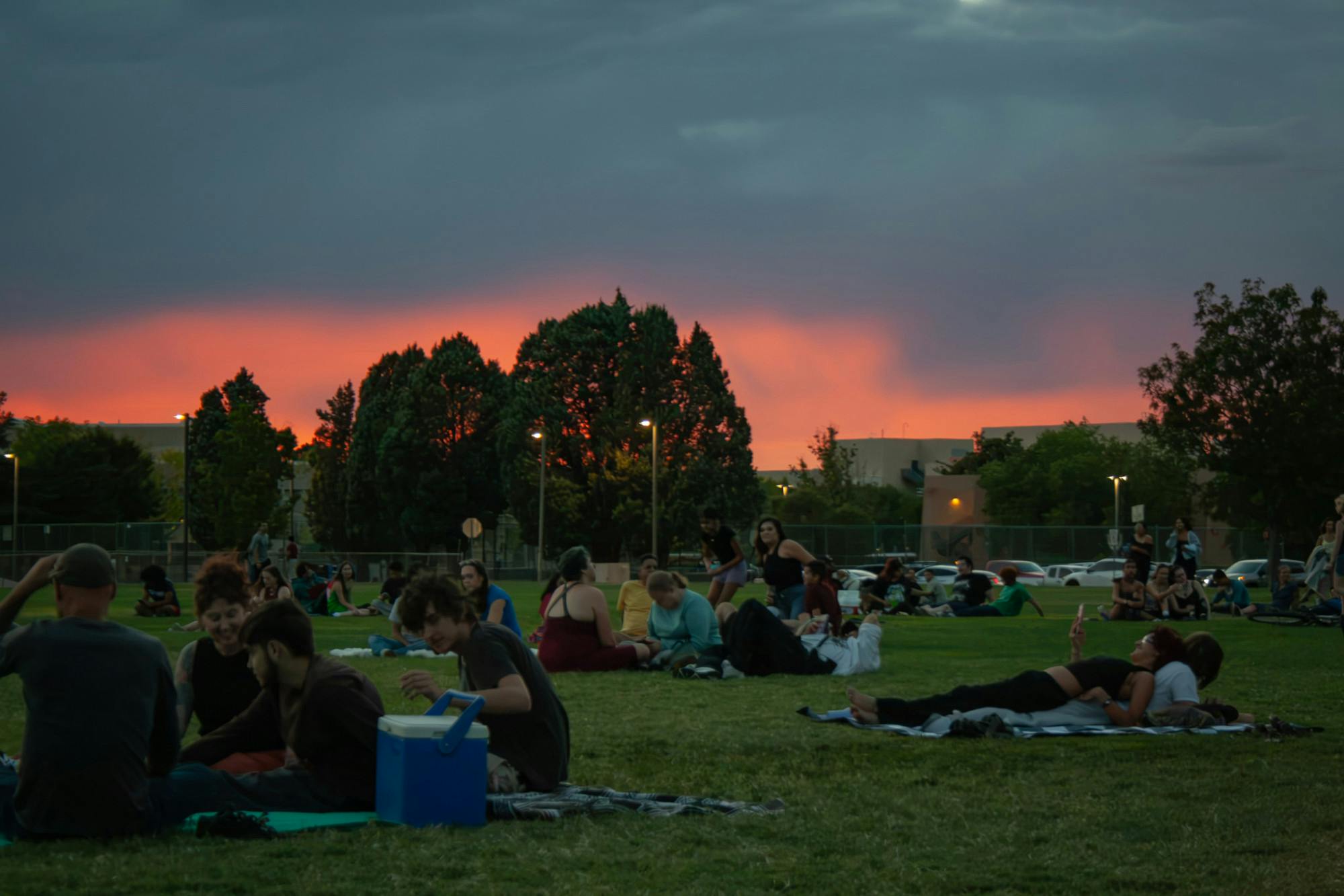 PHOTOSTORY: Students find fun and relaxation during UNM’s 'Movie on the Field' event. 