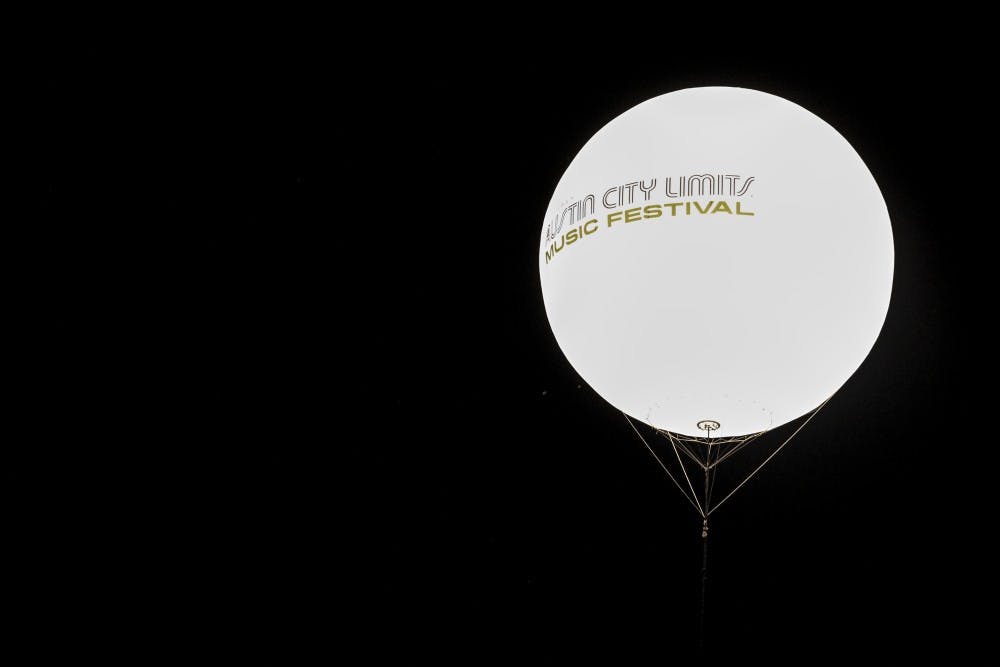 As the days at ACL come to a close large balloons with ACL's logo float into the sky and light up the surrounding area.