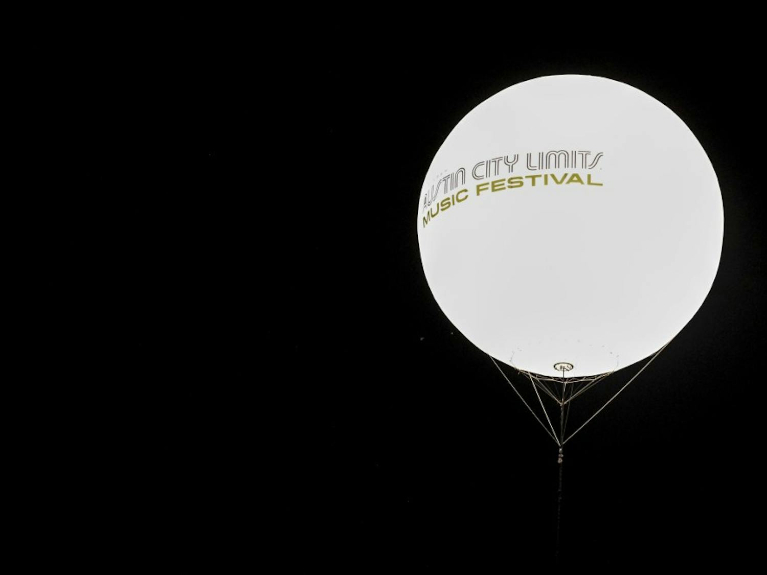 As the days at ACL come to a close large balloons with ACL's logo float into the sky and light up the surrounding area.