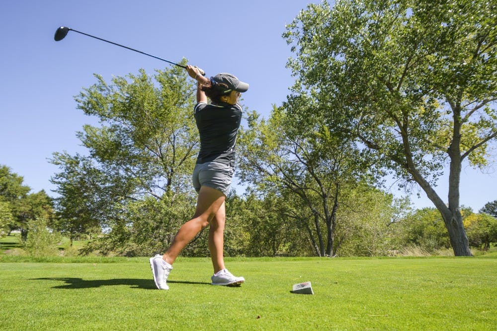 Senior Manon Mollé drives a ball down range during practice Sunday, Sept. 11, 2016 at the UNM Championship Course. The Lobos will host the Branch Law Firm/Dick McGuire competition beginning on Monday.