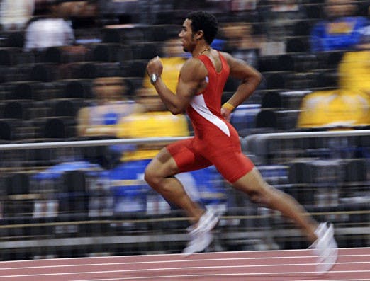 Jarrin Solomon runs the 500-meter dash on Saturday at the Albuquerque Convention Center.