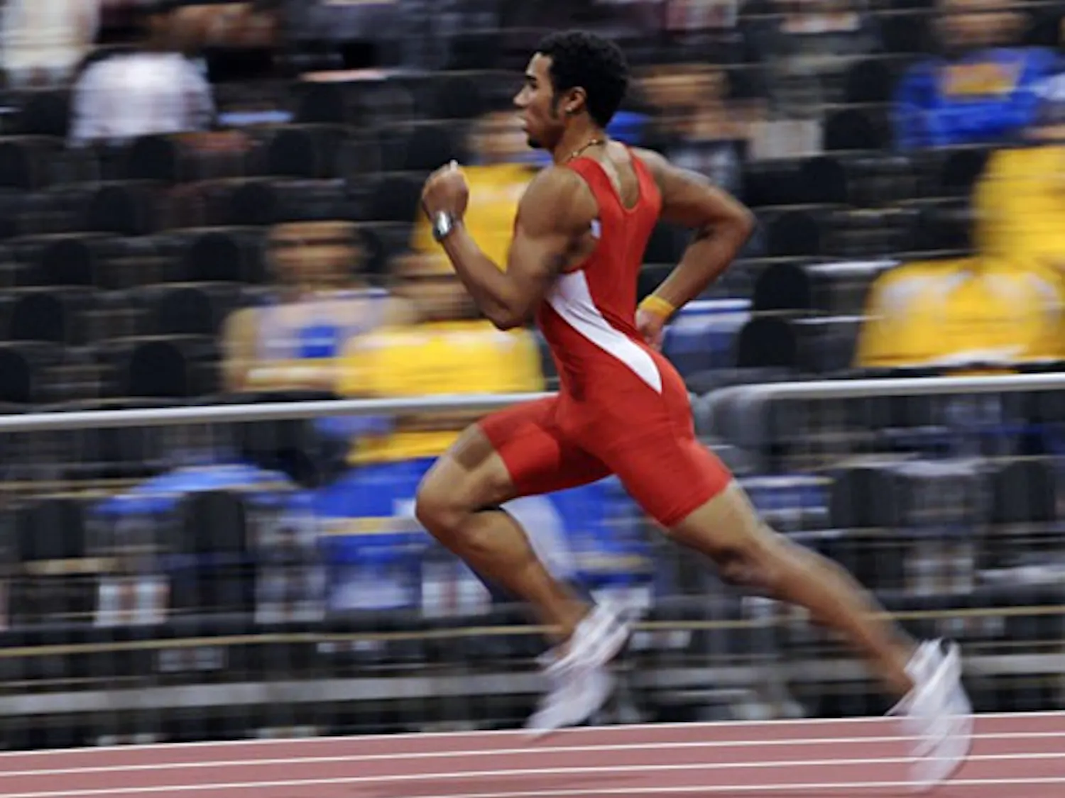 Jarrin Solomon runs the 500-meter dash on Saturday at the Albuquerque Convention Center.