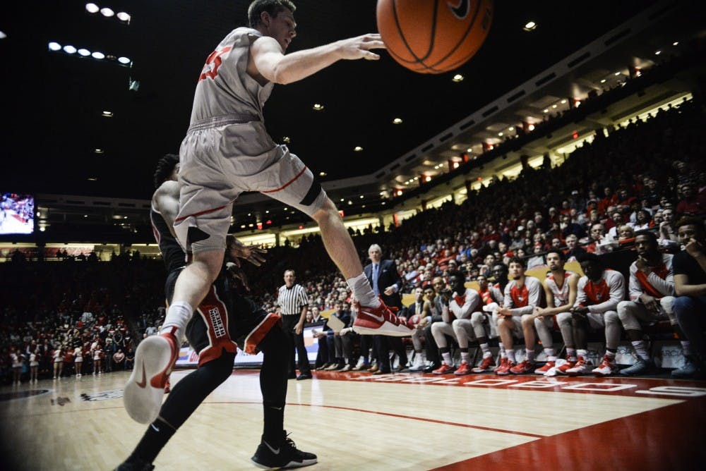 Junior forward Joe Furstinger jumps in the air to prevent a out of bound ball Tuesday, Jan. 10, 2016 at WisePies Arena. 