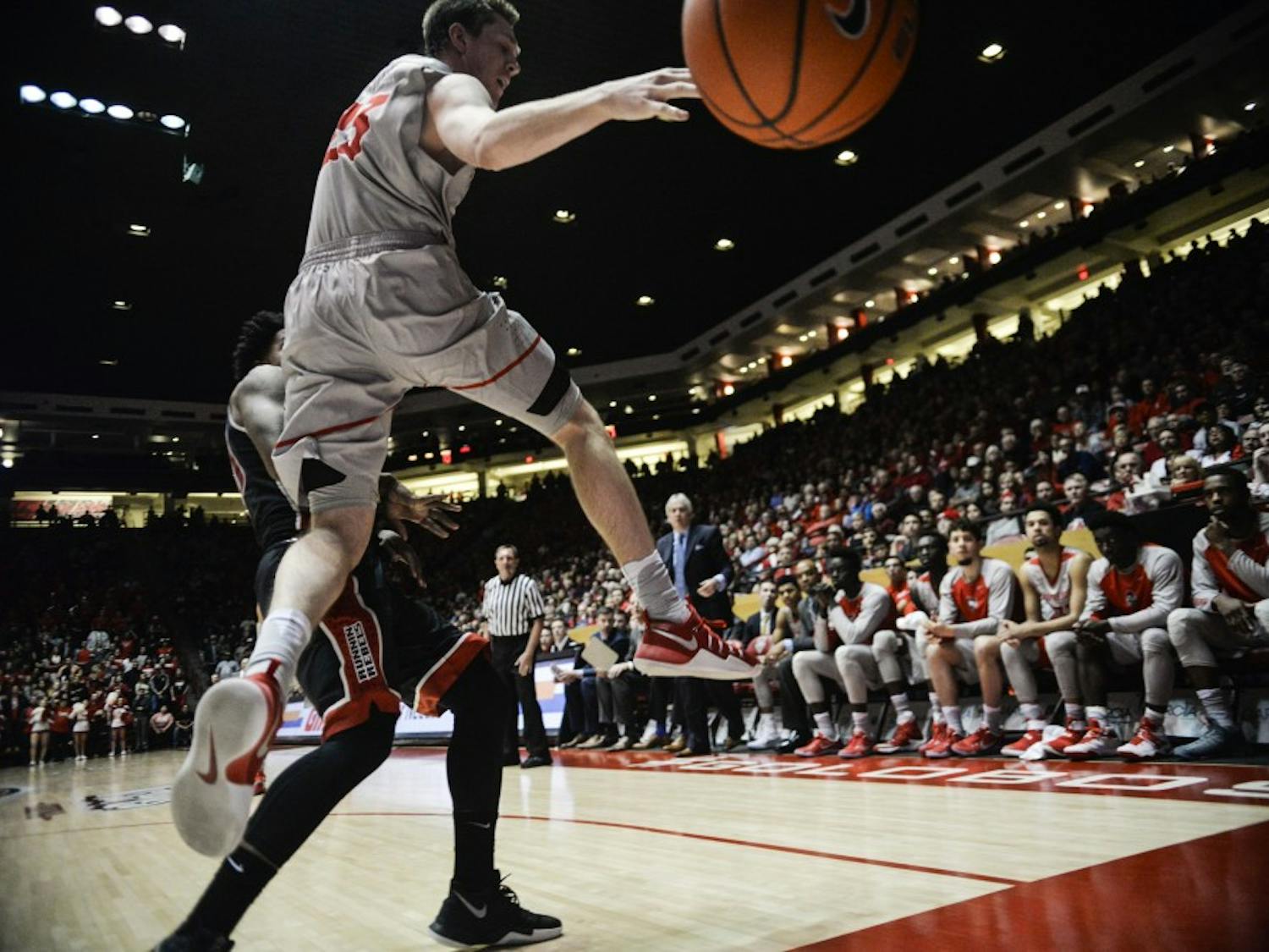 Junior forward Joe Furstinger jumps in the air to prevent a out of bound ball Tuesday, Jan. 10, 2016 at WisePies Arena. 