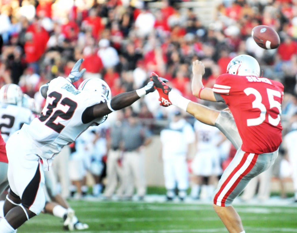 	UNM punter Ben Skaer has his punt blocked in the Lobos’ 52-17 loss to Texas Tech Saturday at University Stadium. Head coach Mike Locksley said his team needs to play “smarter.” 