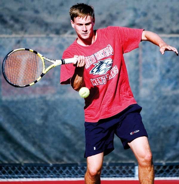 UNM's Joe Wood hits a forehand during practice Thursday at the UNM Tennis Complex.