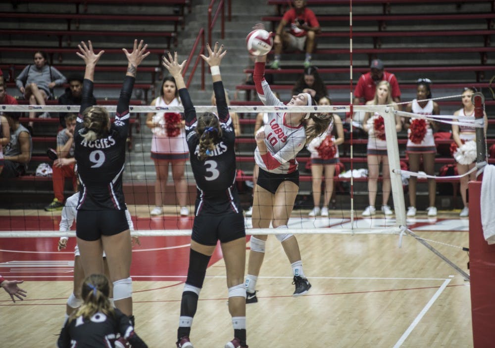 Lauren Twitty spikes the ball during the third set of Saturday’s matchup against New Mexico State University at Dreamstyle Arena – The Pit. The Aggies won in straight sets, 3-0.