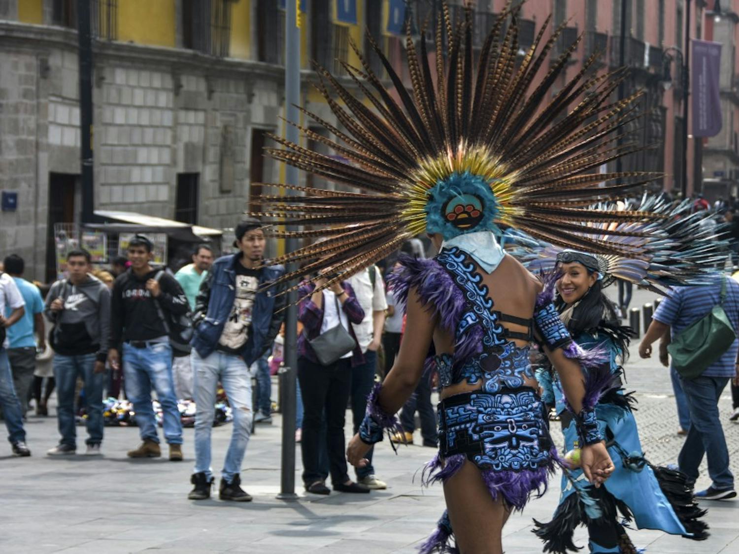 Traditional Aztec dance being performed for tourists and citizens in Mexico City July 8, 2018.