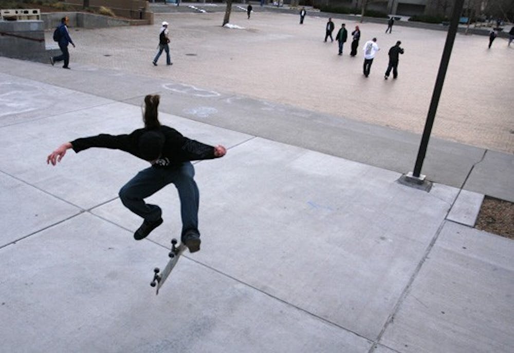 Student Jackson Sabol skateboards outside the SUB on Monday. This weeks warm weather has brought many students outdoors.