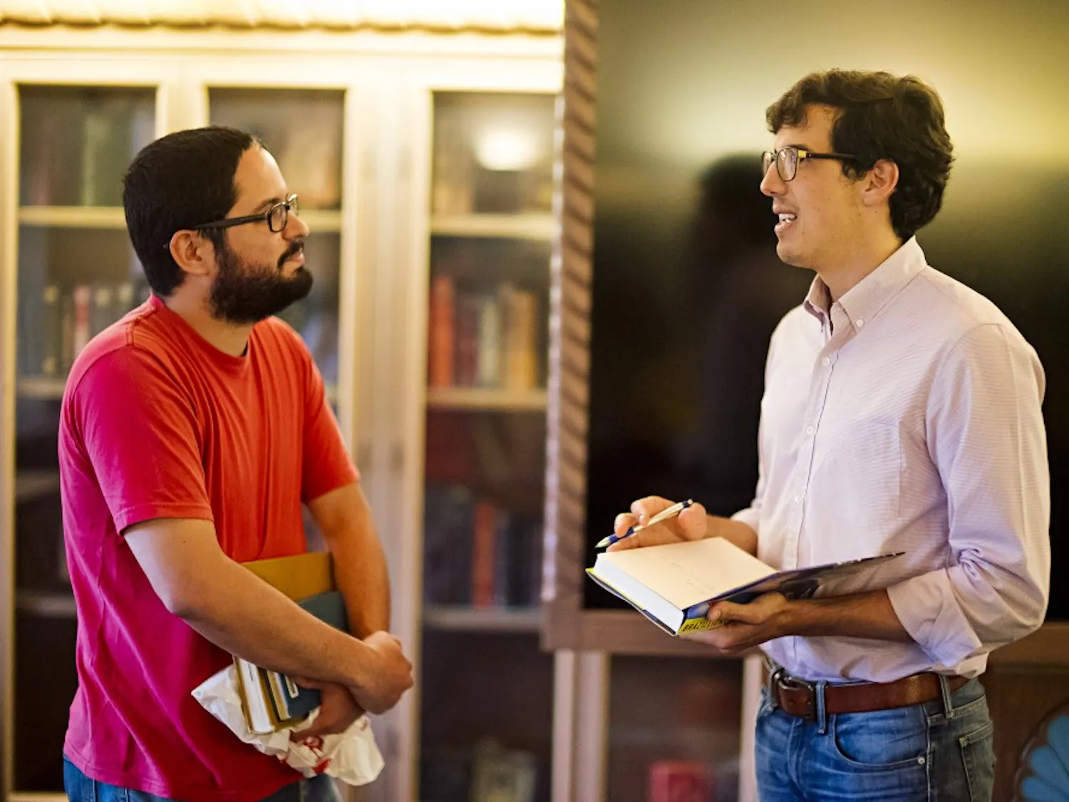 Journalist Alex Cuadros (right) speaks with Eduardo Lima (left0 at UNM Zimmerman Library in Willard Room on Tuesday September 6th 2016