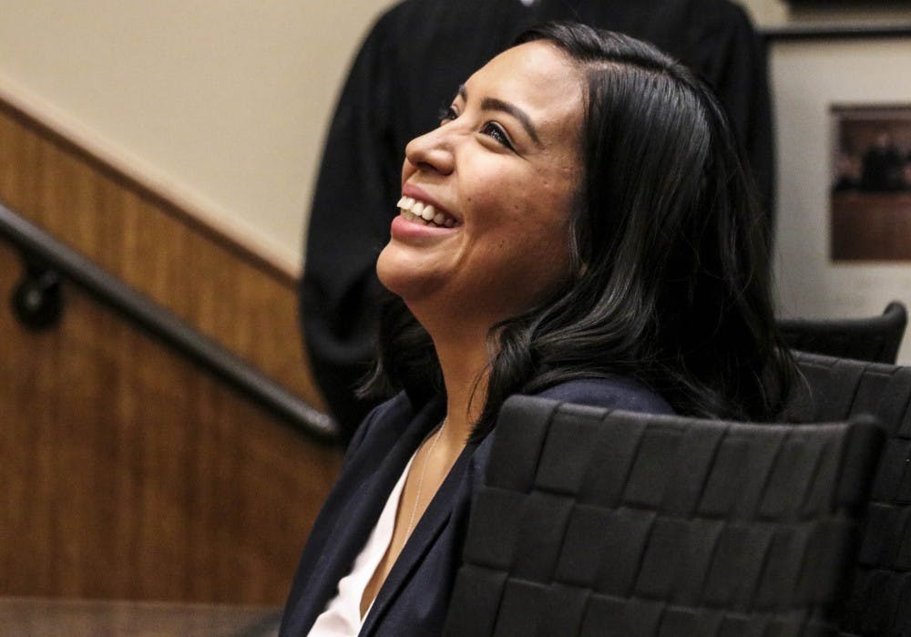 Jazmin Coronel smiles as speakers introduce her before being sworn into the New Mexico State Bar by Justice Chavez, of the New Mexico Supreme Court Dec. 14, 2017. 