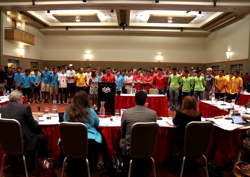 High school soccer players came to protest the announcement that the UNM's men's soccer team was on the chopping block for the Board of Regents on July 19, 2018.