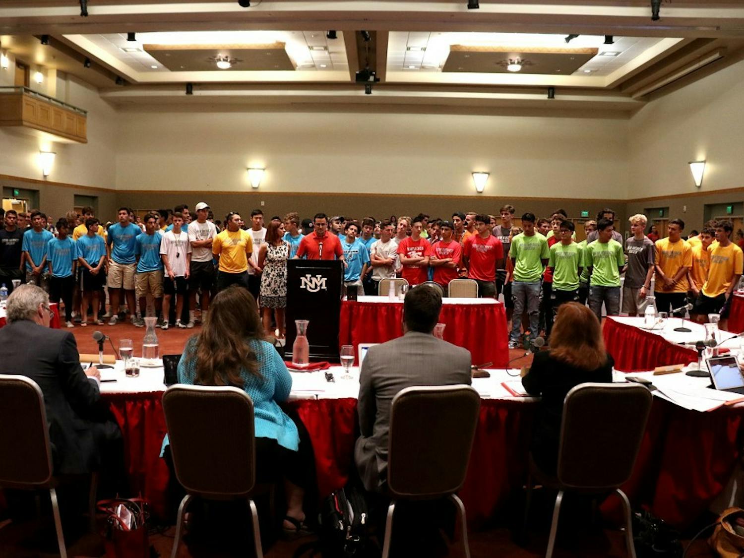 High school soccer players came to protest the announcement that the UNM's men's soccer team was on the chopping block for the Board of Regents on July 19, 2018.