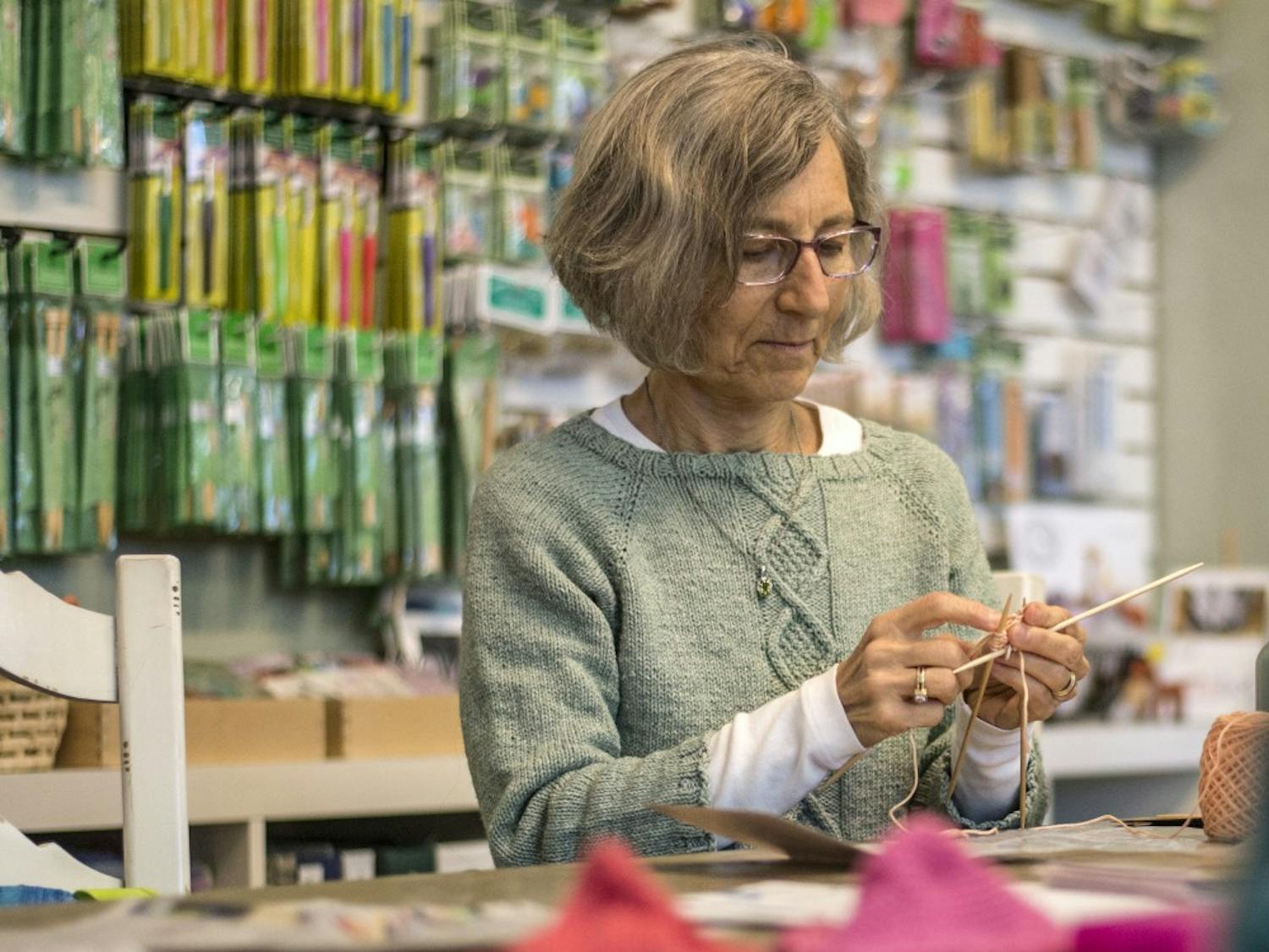 Sarah Fitzpatrick works on a knit prosthetic for breast cancer survivors at the Nob Hill Yarn Store Tuesday afternoon. Fitzpatrick was accompanied by Sara Kirkish who oversees Knitted Knockers a foundation aimed to provide more comfortable knitted solutions to the already existing prosthetics offered. 