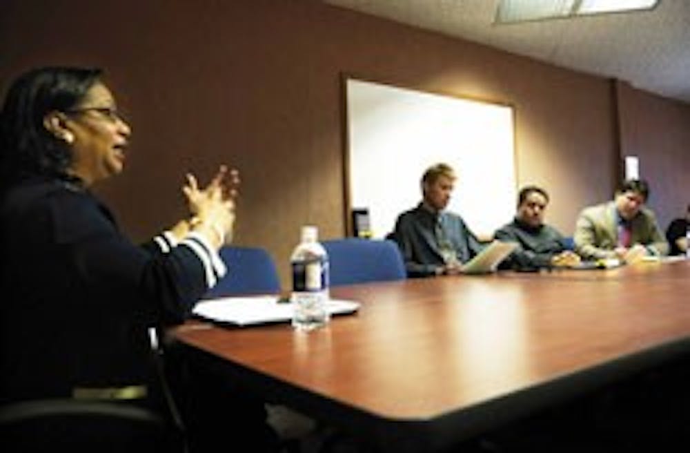 Barbara Lofton, left, one of three final candidates for the new position of associate vice president for student affairs/diversity, answers questions from the audience during the forum held in the Dean of Students Office Conference Room on Monday. 