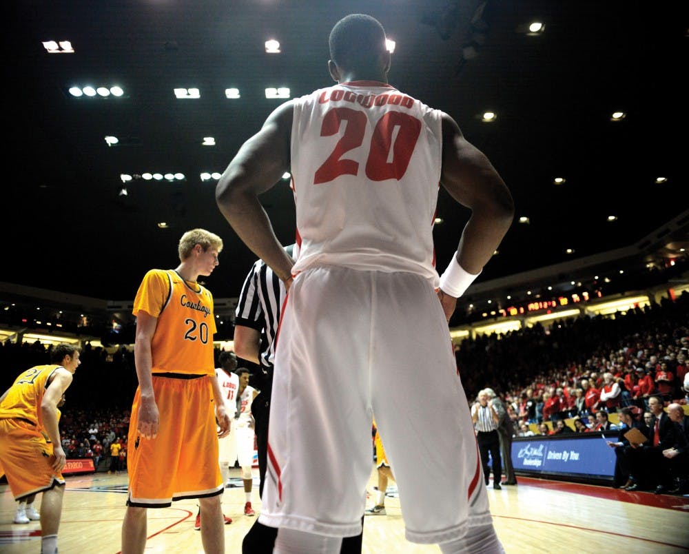 Sophomore guard/forward Sam Logwood stands on the sideline and waits to put the ball in play Saturday, Jan. 16, 2016 at WisePies Arena. The Lobos lost to Wyoming 70-68.