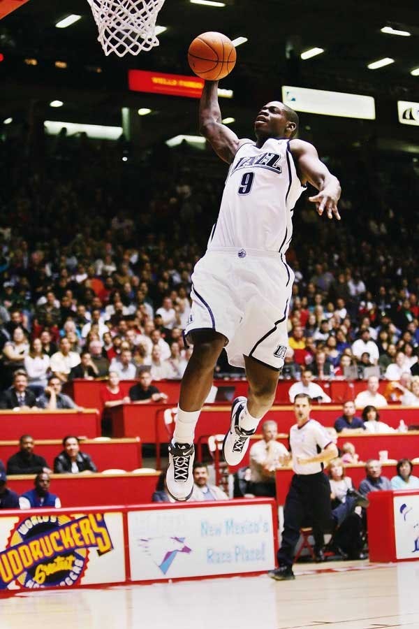Utah Jazz's Ronnie Brewer dunks during the second quarter of an exhibition game at The Pit against the Sacramento Kings on Thursday.  