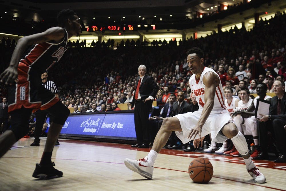 Redshirt sophomore guard Elijah Brown tries to cross a UNLV player Tuesday, Feb. 2, 2016 at WisePies Arena. The Lobos beat UNLV 87-83. 