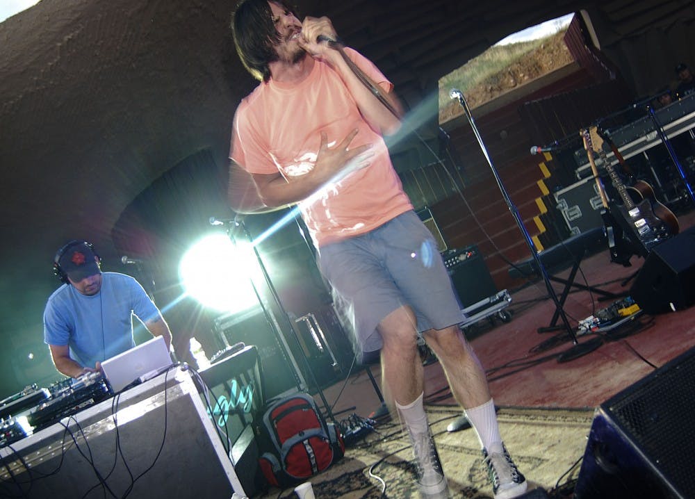 	Eyedea, center, and Abilities perform at the Paolo Soleri amphitheater in Santa Fe on Aug. 15. Their new album “By the Throat” was released at the end of July. 