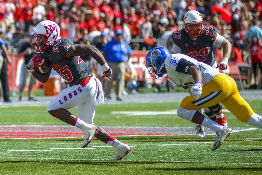 Redshirt sophomore Tyrone Owens outruns a San José State defender on Saturday, Oct. 1, 2016 at University Stadium. The Lobos defeated the San Jose State Spartans 48-41.