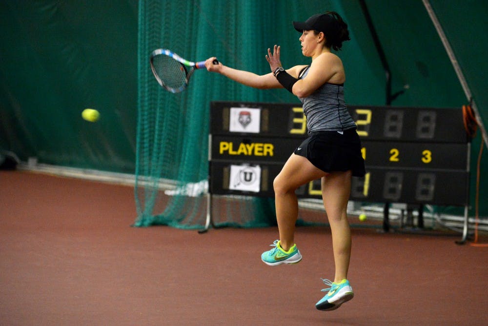 Redshirt junior Andrea Leblanc jumps in the air to return a ball Sunday, Feb. 20, 2016 at the Linda Estes Tennis Center. The Lobos will play Houston and Rice this upcoming weekend in Houston, Texas.