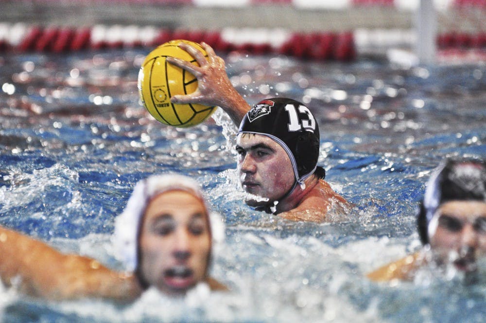Matt Simmons gets ready to pass the ball at Johnson pool against Arizona State.