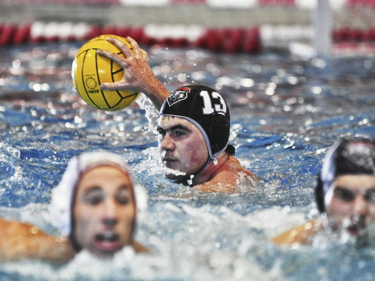 Matt Simmons gets ready to pass the ball at Johnson pool against Arizona State.