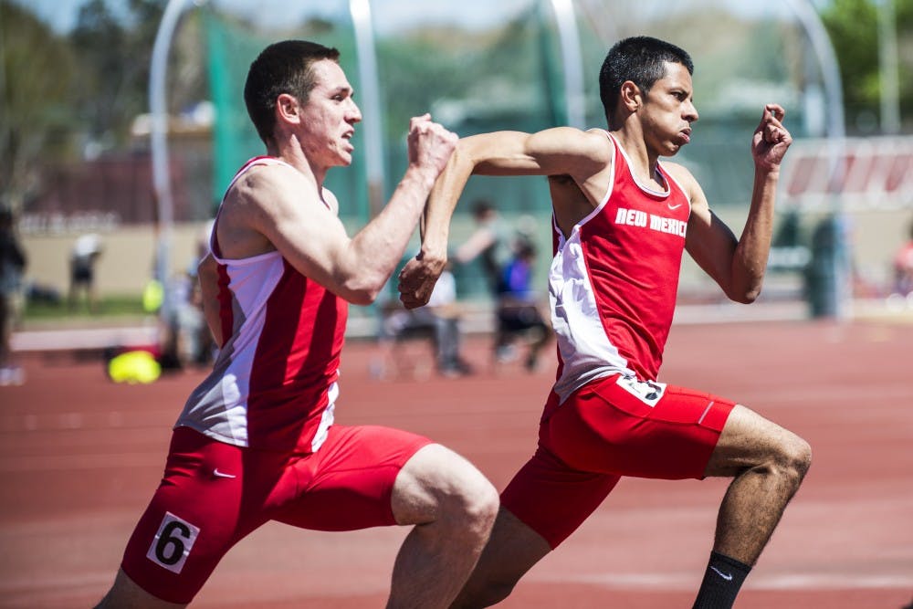 Senior sprinter Chris Kline (left) and freshman sprinter Carlos Salcido run during the Don Kirby Tailwind Invitational Saturday April 2, 2016 at the UNM Track Stadium. The Lobos competed in the Sun Angel Classic this past weekend.&nbsp;