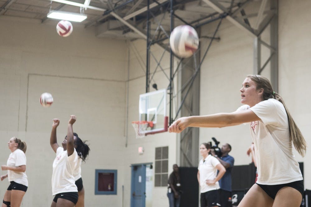 	New Mexico volleyball outside hitter Cassie House, right, practices with her teammates at Johnson Gym on Aug. 11. The volleyball team will host its annual alumnae game inside Johnson Center on Saturday at 7 p.m.