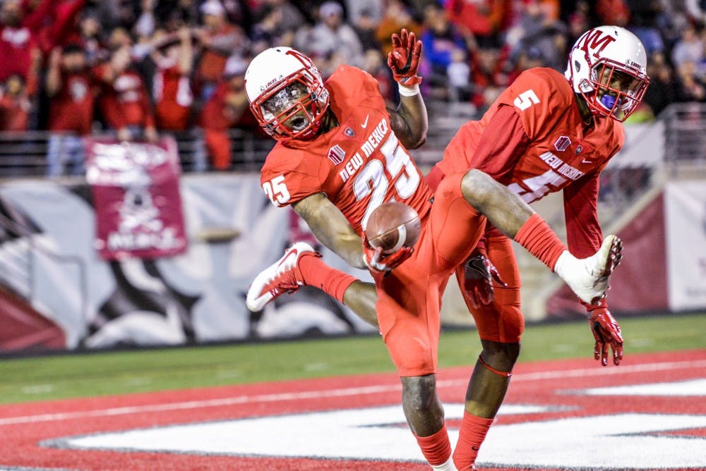 Redshirt sophomore running back Tyrone Owens lands back in the end zone after jumping up and celebrating the Lobos’ first touchdown against Boise State on Friday, Oct. 7, 2016 at University Stadium. The Lobos will play their third conference game against Air Force this Saturday in Dallas, Texas.