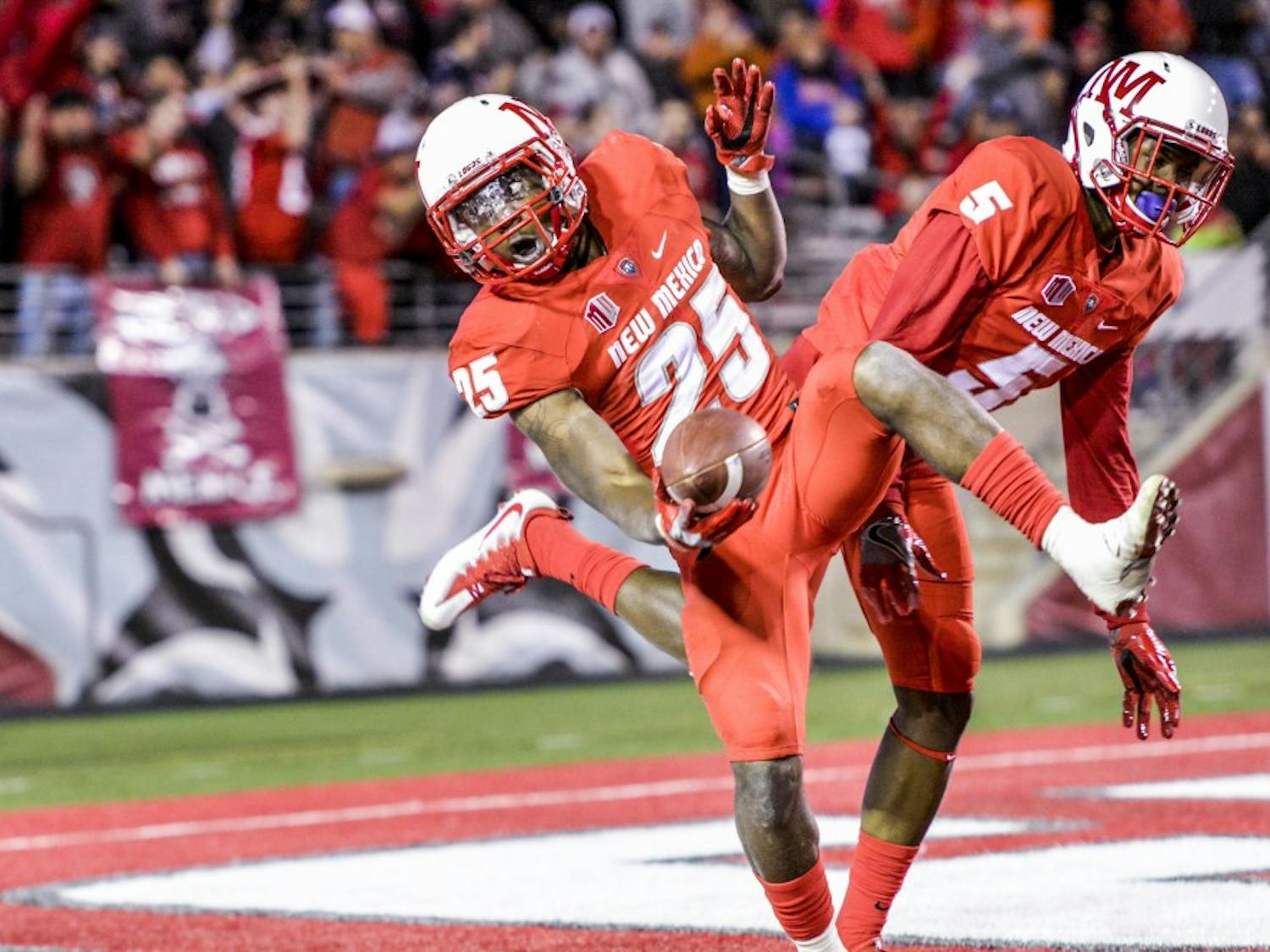 Redshirt sophomore running back Tyrone Owens lands back in the end zone after jumping up and celebrating the Lobos’ first touchdown against Boise State on Friday, Oct. 7, 2016 at University Stadium. The Lobos will play their third conference game against Air Force this Saturday in Dallas, Texas.