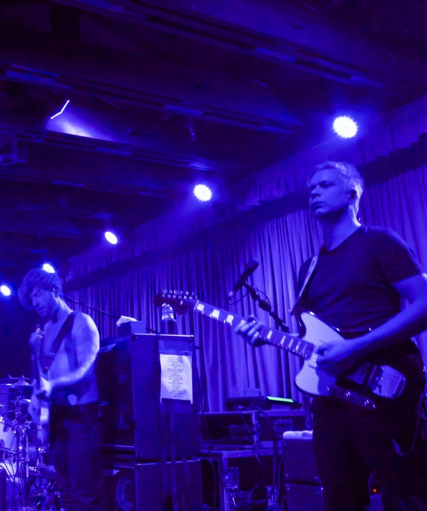 Vennart (right) and bassist Ben Johnston performing "Living is a Problem Because Everything Dies" at the Crescent Ballroom, 3/4/17