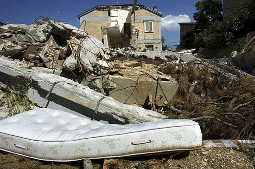 Abandoned furniture and other household items are common in many areas that are still awaiting repair after the April 6 earthquake in L'Aquila, Italy, as seen here July 14. UNM will help students in the town who were affected by the disaster. 