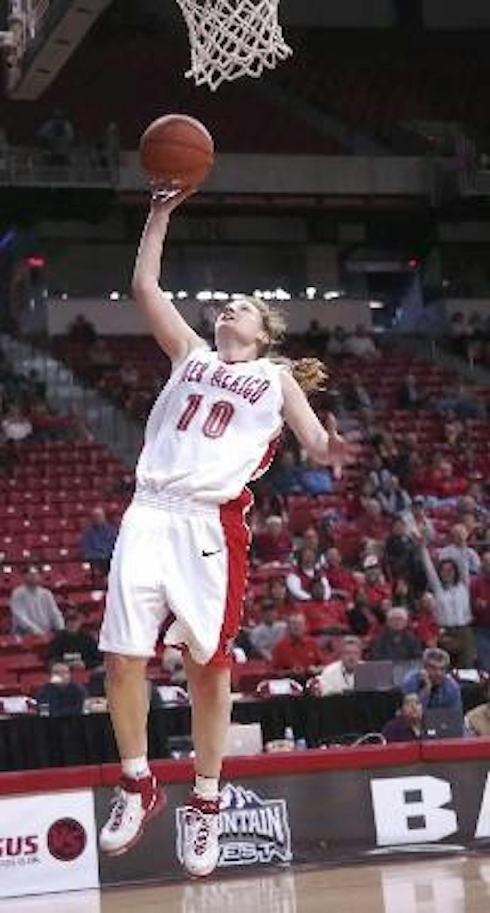 Guard Amy Beggin makes a layup after a breakaway during Wednesday's game against No. 6-seeded UNLV in the quarterfinal round of the Mountain West Conference Tournament in Las Vegas. The no. 3-seeded Lobos won 80-52 and will face No. 2-seeded Wyoming on Fr