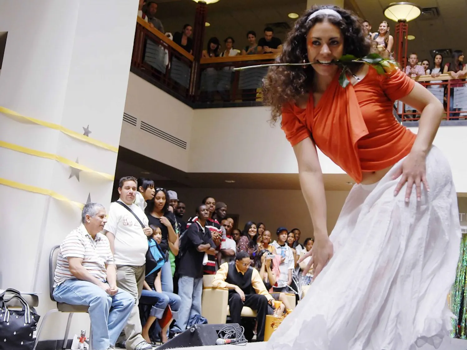 Julianne Apodaca poses at the end of the runway during Peaches and Cream Fashion Show sponsored by Black Men in Motion on Monday in the SUB.